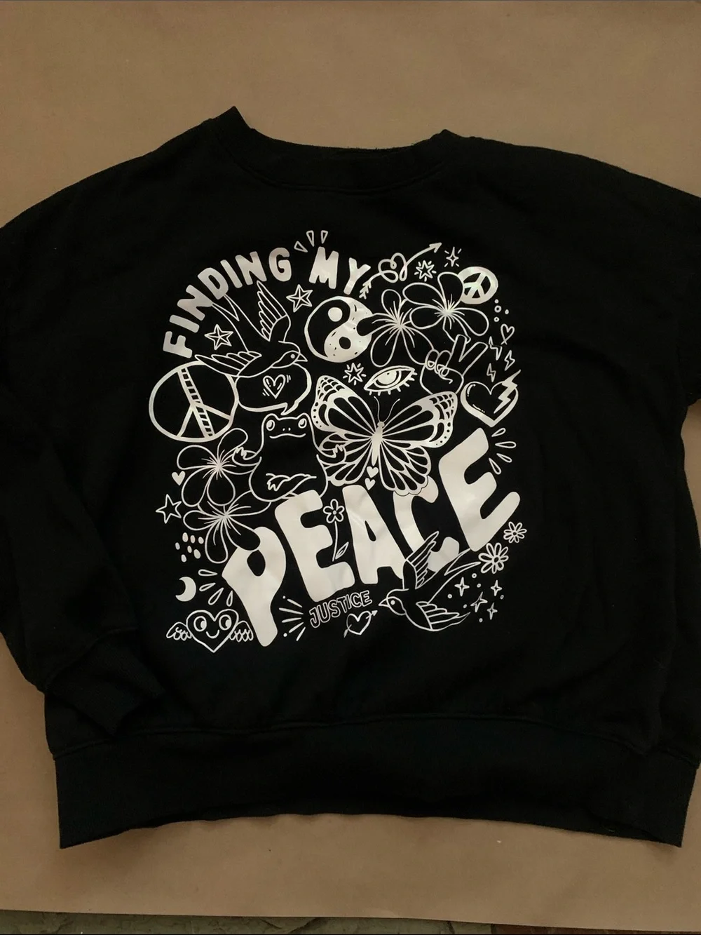 Justice Black Sweatshirt with White Peace Graphic